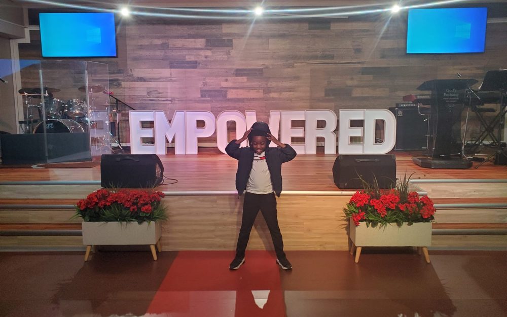 A young person on the EMPOWERED stage