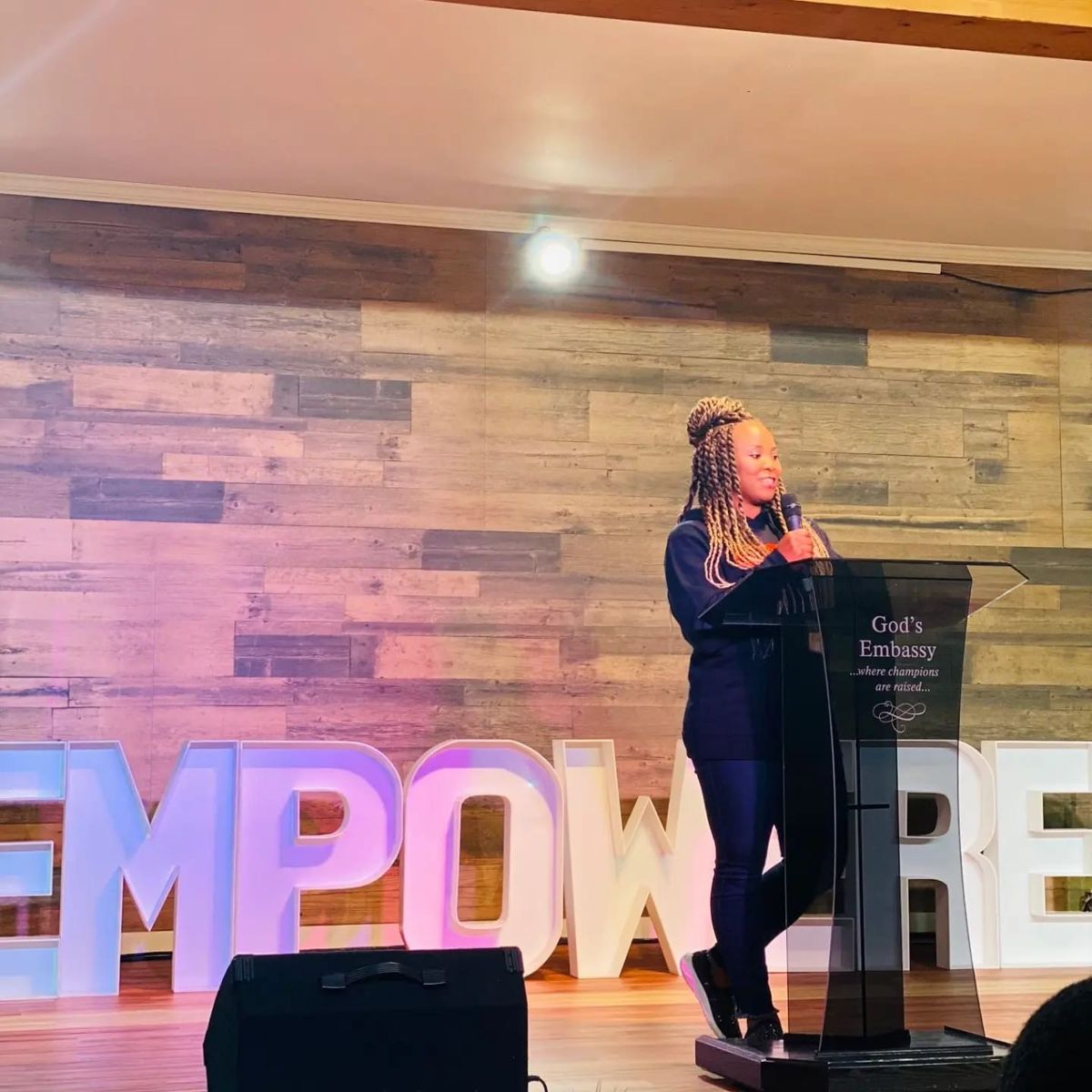 A speaker on the EMPOWERED stage